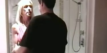 Busty blonde gets fucked in the shower